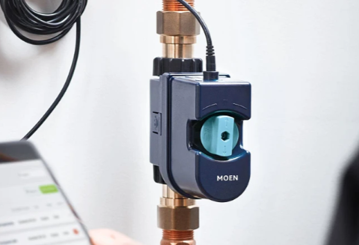 Moen water control valve with smartphone app on a white background
